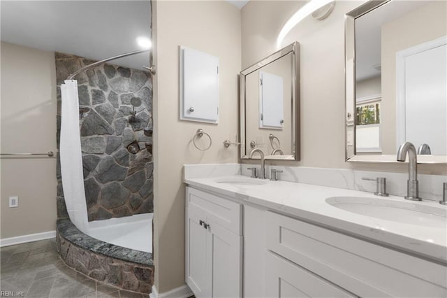 bathroom featuring vanity and walk in shower