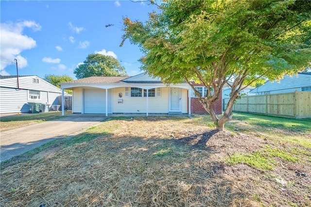 view of front of house with a garage and a front yard