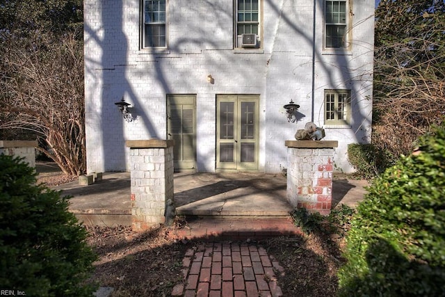 property entrance with cooling unit