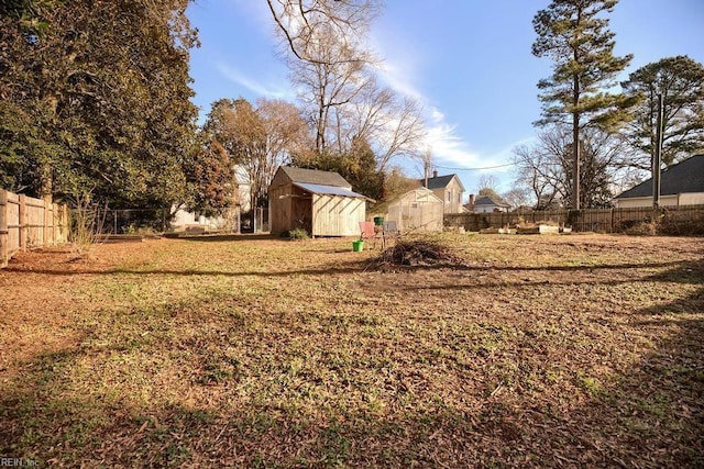 view of yard with a storage unit