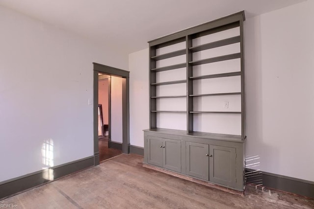 empty room featuring hardwood / wood-style flooring