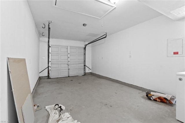 garage featuring washer / dryer and electric panel