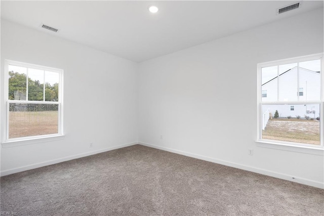 empty room with carpet flooring