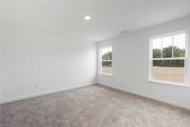 view of carpeted spare room