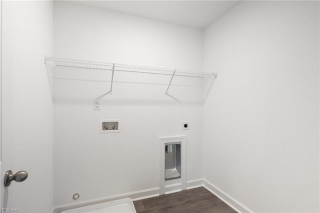 washroom with hookup for an electric dryer, hookup for a washing machine, and dark hardwood / wood-style flooring