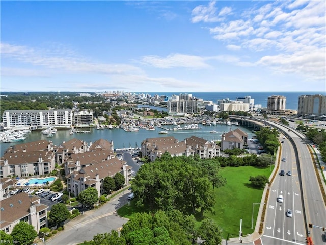 birds eye view of property featuring a water view