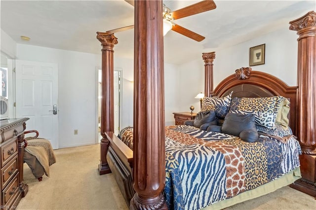 bedroom featuring ceiling fan and light carpet