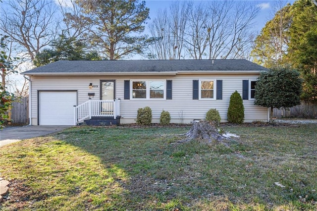 single story home featuring a garage and a front lawn