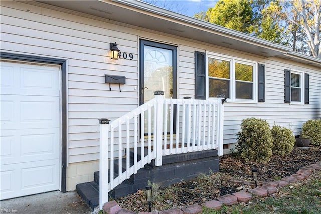 entrance to property with a garage