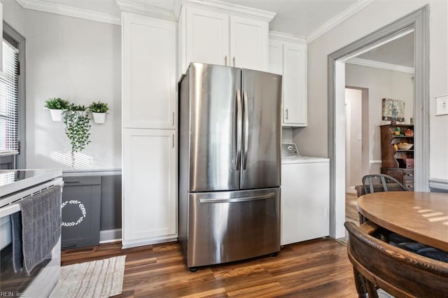 kitchen featuring dark wood-type flooring, white cabinets, stainless steel fridge, ornamental molding, and washer / dryer