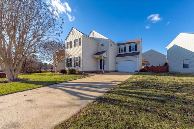 view of front of home featuring a garage and a front lawn