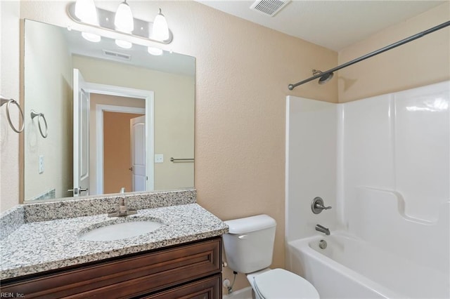 full bathroom with vanity, toilet, and tub / shower combination