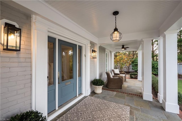 view of patio / terrace featuring ceiling fan