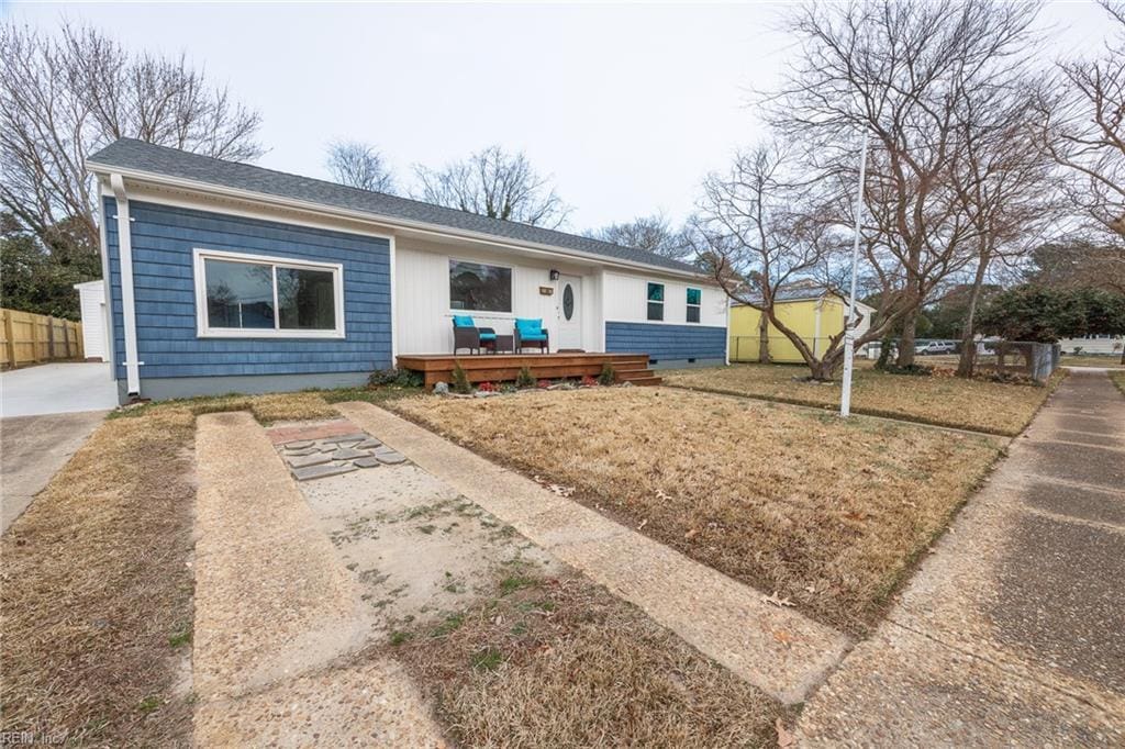 ranch-style house featuring a deck