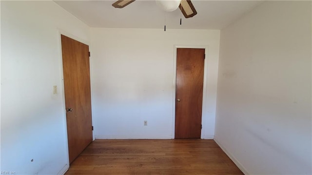 interior space with ceiling fan and light hardwood / wood-style flooring