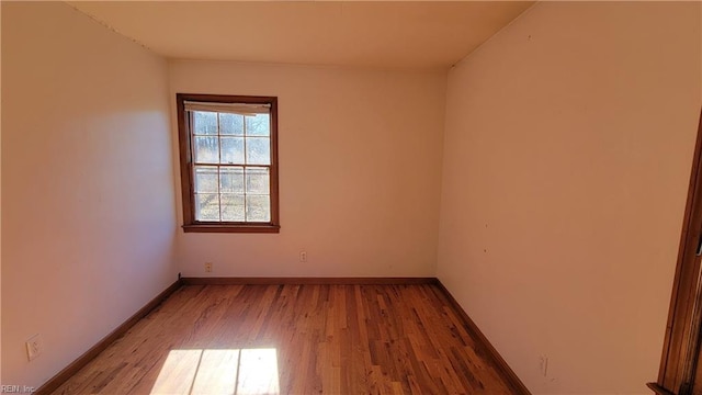 spare room with light wood-type flooring