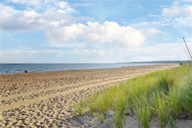 view of water feature with a beach view