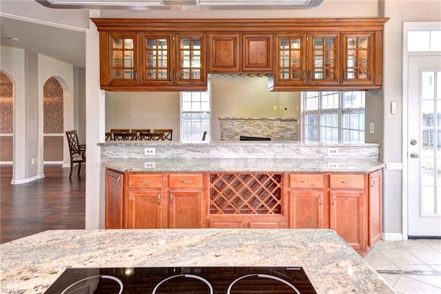 kitchen featuring light stone countertops