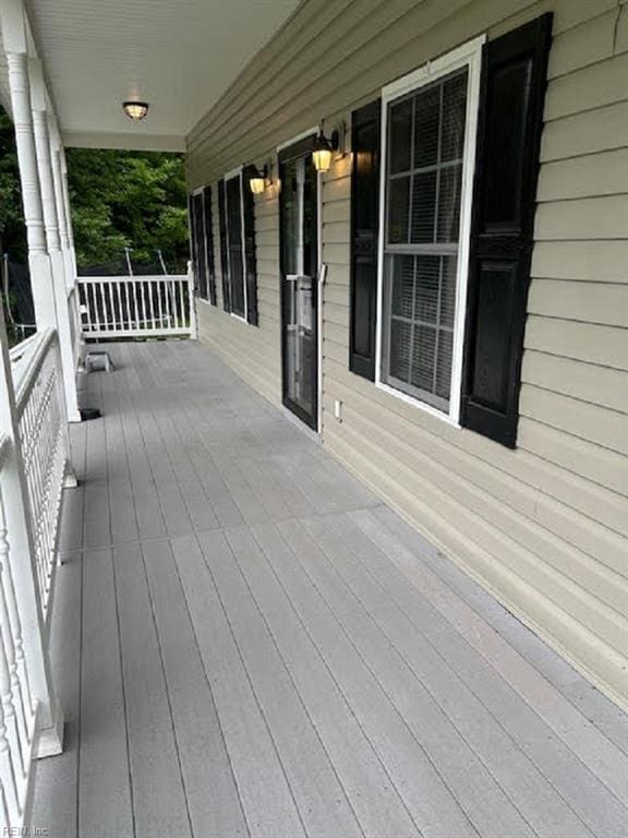 wooden deck featuring a porch