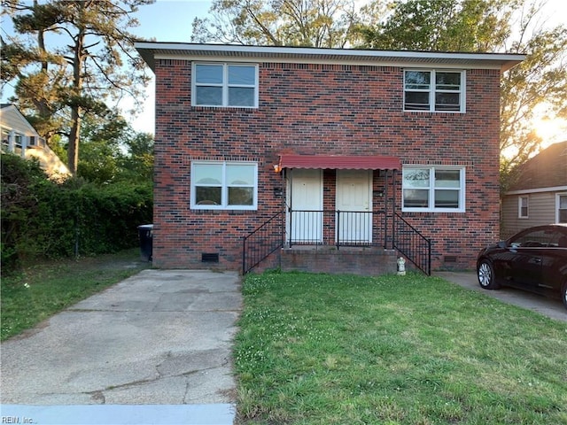 view of front of home with a front yard