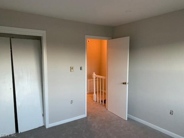 unfurnished bedroom with a closet