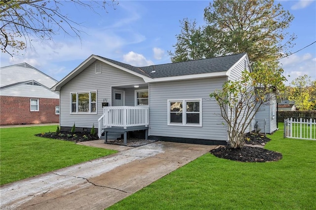 single story home with a front yard