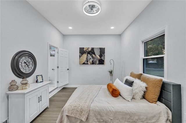 bedroom featuring hardwood / wood-style flooring