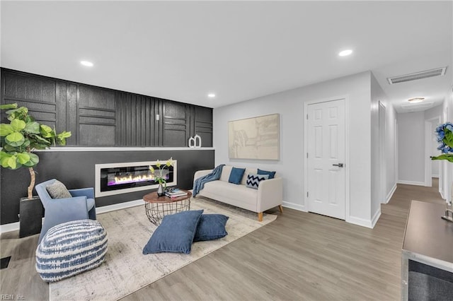 living room with hardwood / wood-style flooring