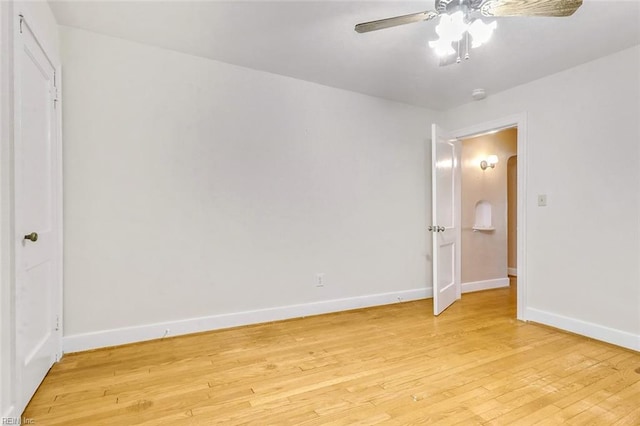 unfurnished bedroom with light wood-type flooring and ceiling fan