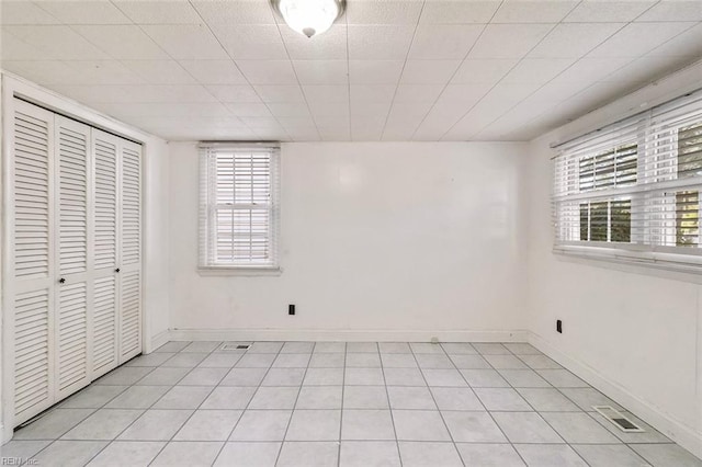 unfurnished bedroom featuring a closet