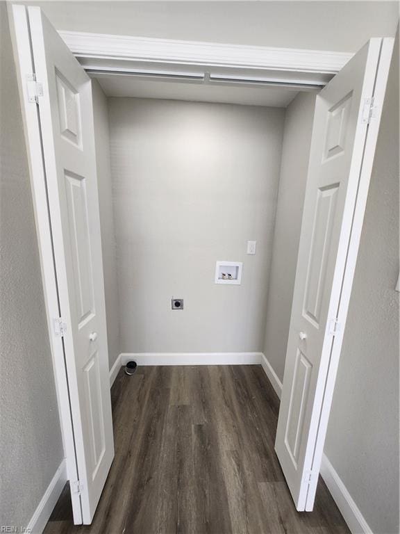 laundry area with dark hardwood / wood-style flooring, washer hookup, and hookup for an electric dryer