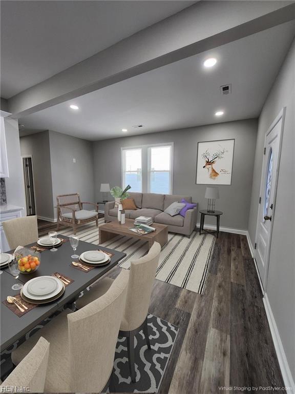 dining room with dark hardwood / wood-style floors