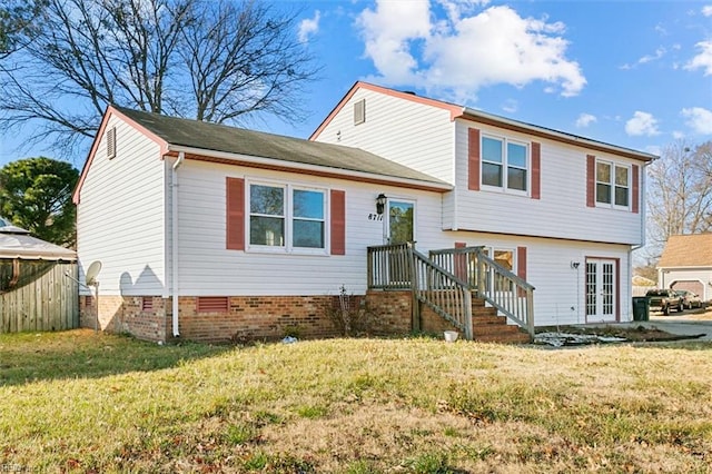 split level home with a front yard