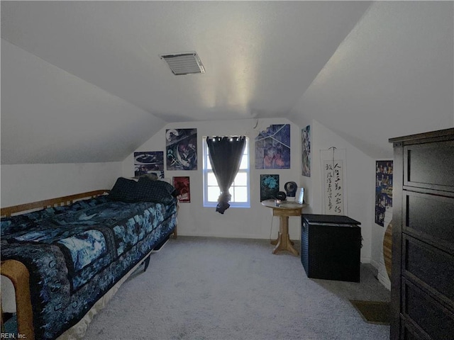 carpeted bedroom featuring lofted ceiling