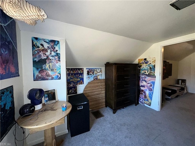 interior space featuring light colored carpet and lofted ceiling