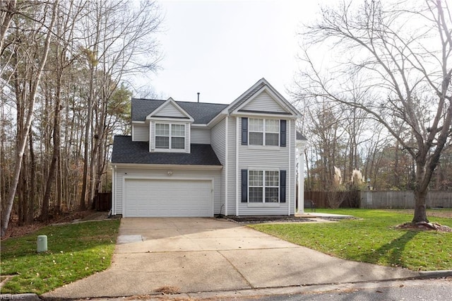 view of front of property with a garage and a front yard