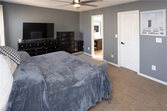 carpeted bedroom featuring ensuite bathroom and ceiling fan