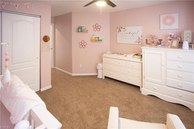 carpeted bedroom featuring ceiling fan