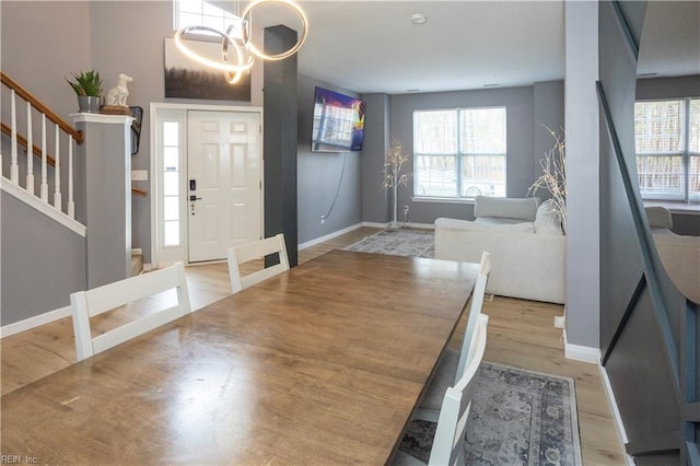 interior space with light hardwood / wood-style flooring and a chandelier