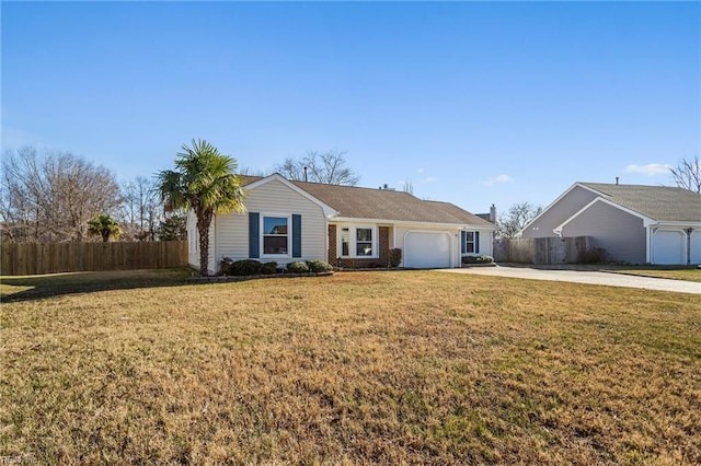 ranch-style house featuring a front lawn and a garage