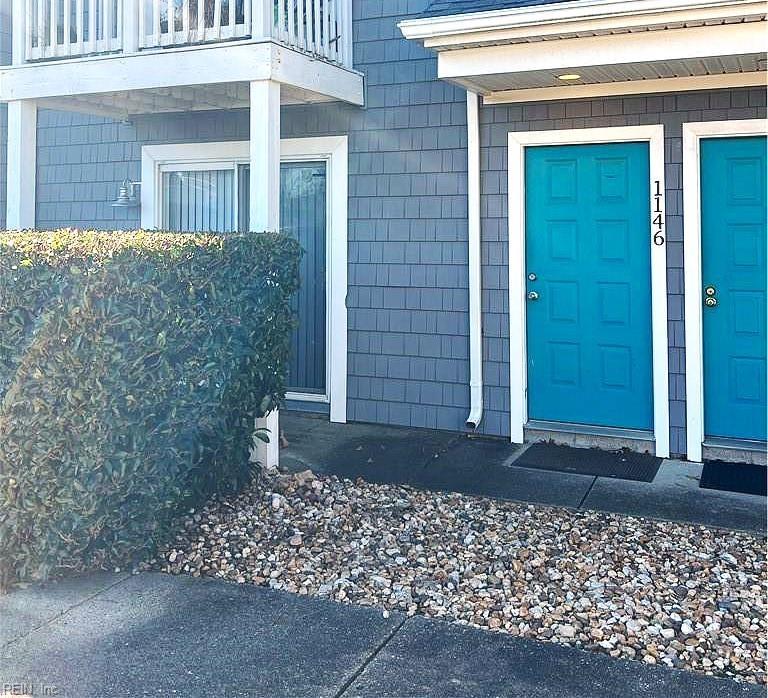 property entrance with a balcony