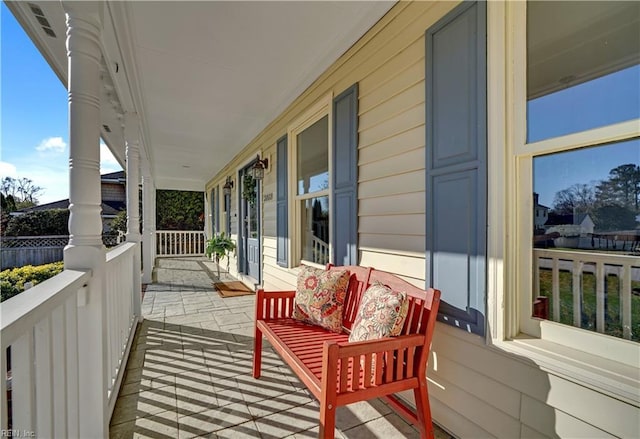 balcony featuring covered porch