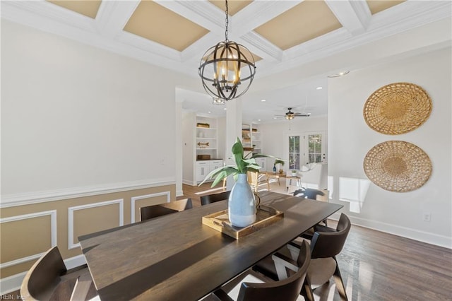 dining area featuring dark wood-type flooring, french doors, coffered ceiling, beamed ceiling, and a chandelier