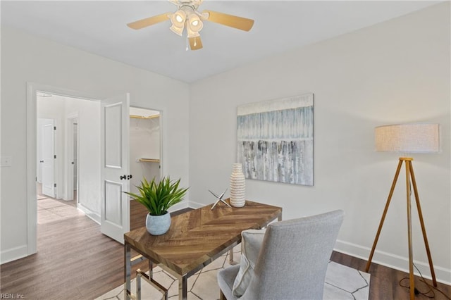 office space with ceiling fan and hardwood / wood-style flooring