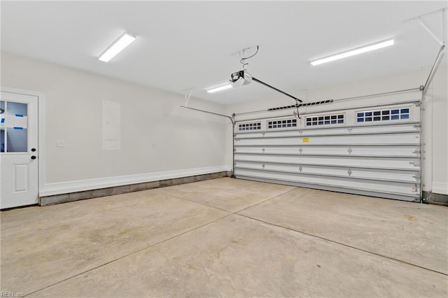 garage featuring a garage door opener