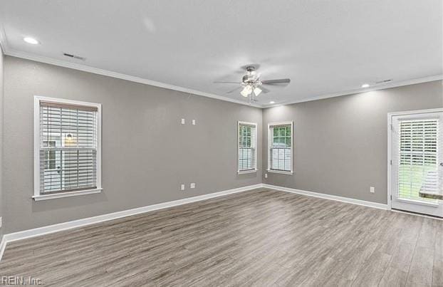 unfurnished room featuring crown molding, ceiling fan, and wood-type flooring