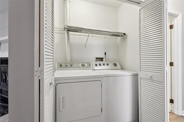 laundry room featuring independent washer and dryer