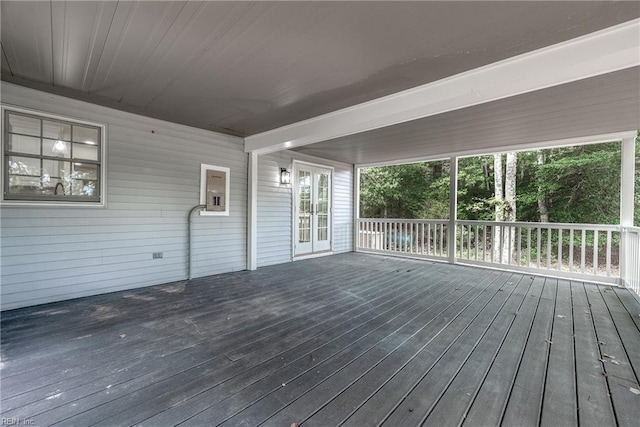 wooden deck featuring french doors