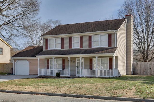 view of front facade with a garage and a front lawn