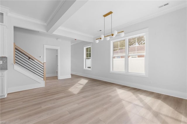 interior space with beamed ceiling, ornamental molding, light hardwood / wood-style flooring, and a chandelier